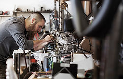 Mechanic Working on Motorcycle